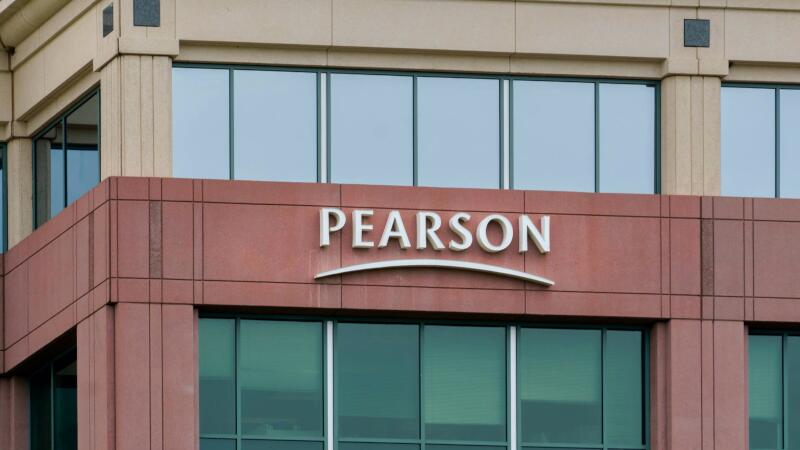 Pearson sees FY adj opg profit 385 mln pounds, up 33%